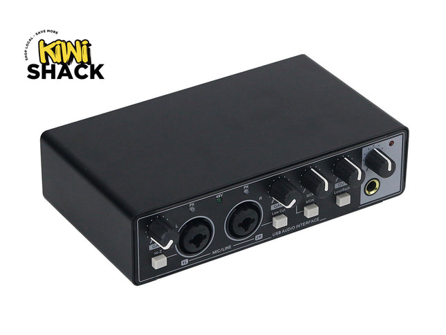 Black audio interface with multiple ports on a white background, featuring the Kiwi Shack logo.