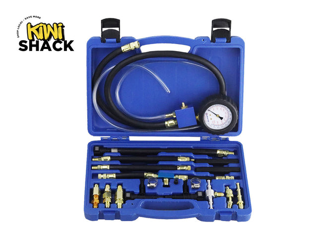 Blue diagnostic tool kit with hoses and gauge on a white background, branded 'Kiwi Shack'.