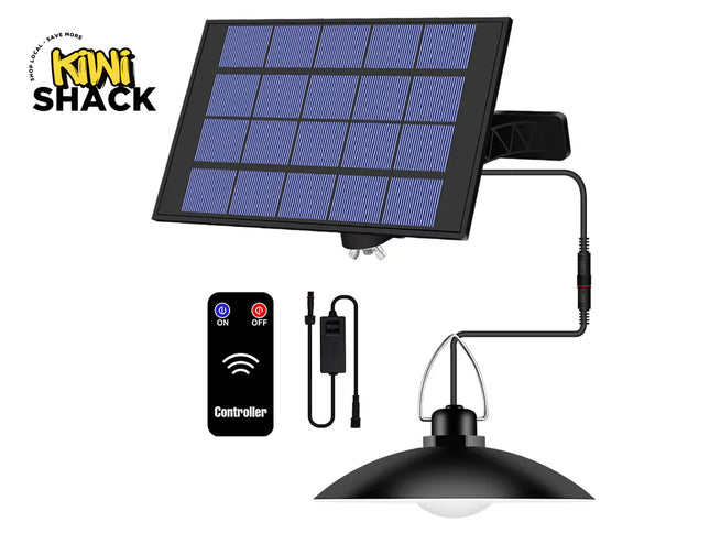 Solar light system with solar panel, controller, and light bulb on a white background, featuring Kiwi Shack brand.