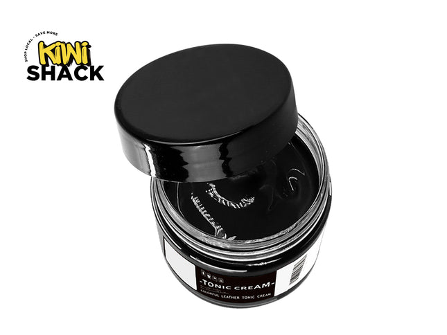 Black jar of tonic cream with a black lid on a white background, featuring the Kiwi Shack logo.