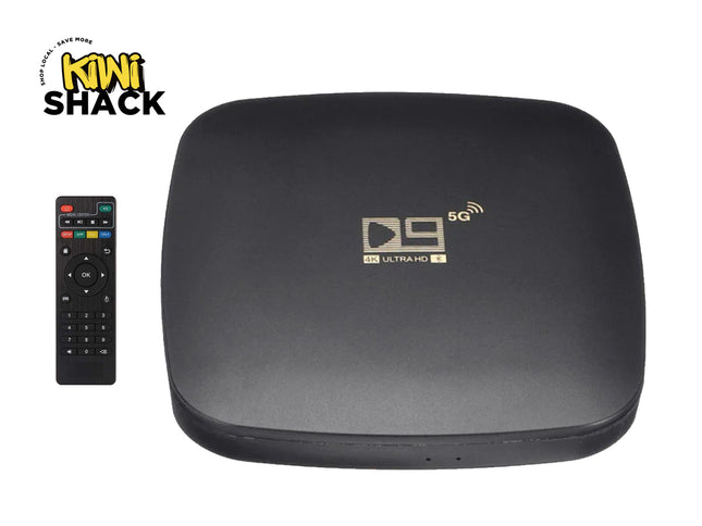 Black electronic device with remote control on a white background, featuring the Kiwi Shack logo.