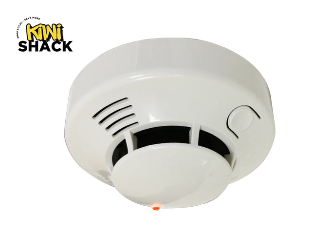 White smoke detector with visible brand logo on a white background