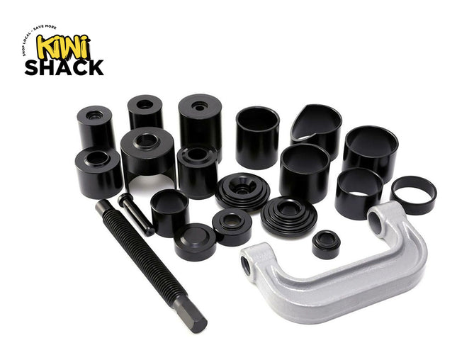 Set of black mechanical components and a silver metal bracket on a white background with 'Kiwi Shack' branding.