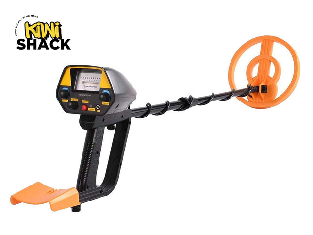 Metal detector with orange coil and foot switch on a white background, branded 'Kiwi Shack'.