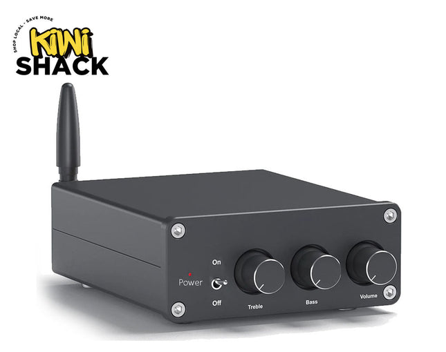 Black audio amplifier with control knobs on a white background, featuring the Kiwi Shack logo.