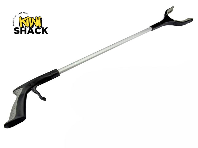 Two-pronged tool with black handles on a white background, branded 'Kiwi Shack'.