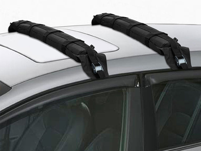 Two black roof racks on a car