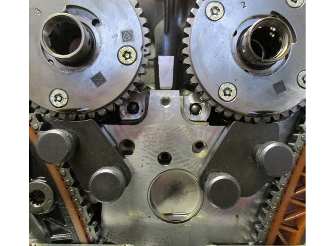 Close-up of mechanical gears and components on a white background