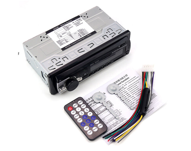 Car stereo system with remote control and wiring harness on a white background