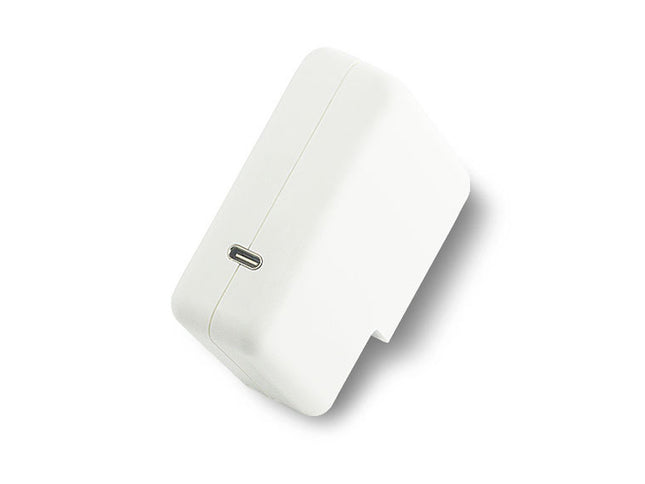 White rectangular object with a USB port on a white background