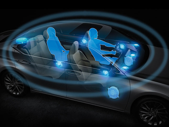 Car interior with blue light indicators around the seats on a black background