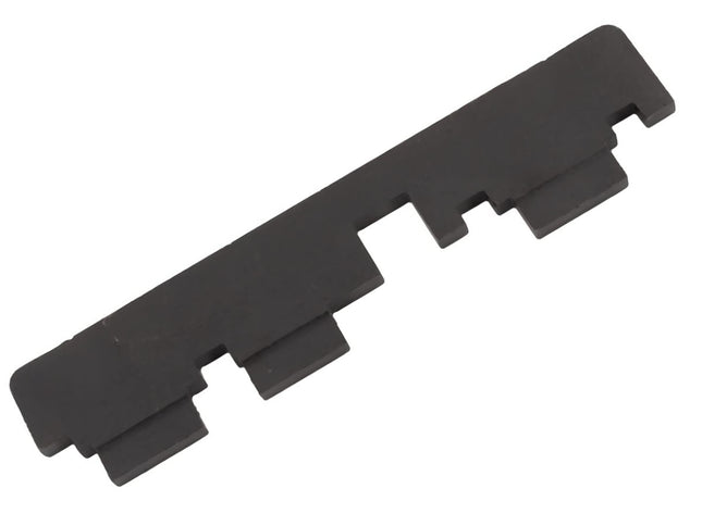 Black plastic strip with multiple notches on a white background