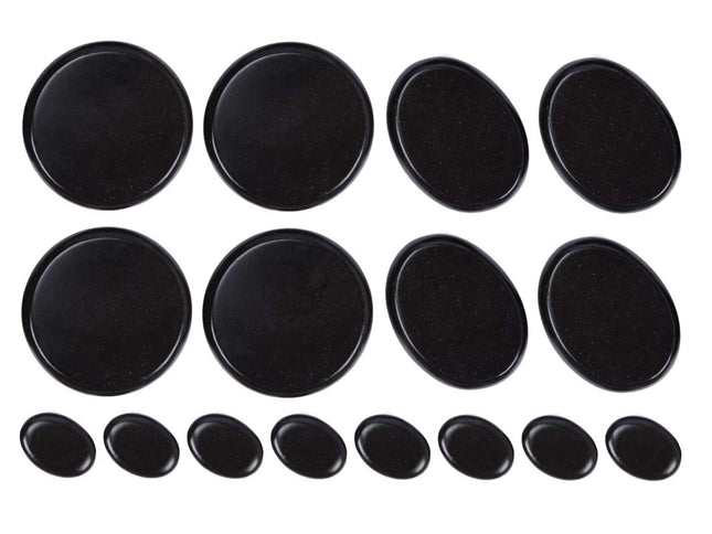 Set of black round stones on a white background