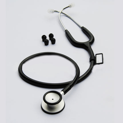 Black stethoscope with three earpieces on a light gray background