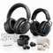 An assortment of wireless over-ear headphones, gaming headsets, and wireless earbuds with charging cases on a white background.