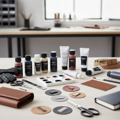 Table with leather goods and craft supplies including bottles, a wallet, and tools.
