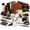 Leather working kit, leather pieces, dyes, waxes, thread, and tools on white.