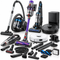 An assortment of vacuum cleaners including stick vacuums, robotic vacuums, uprights, cylinder vacuums, and handheld vacs with various cleaning attachments.