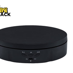 Black electronic device with remote control on a white background, featuring the Kiwi Shack brand.