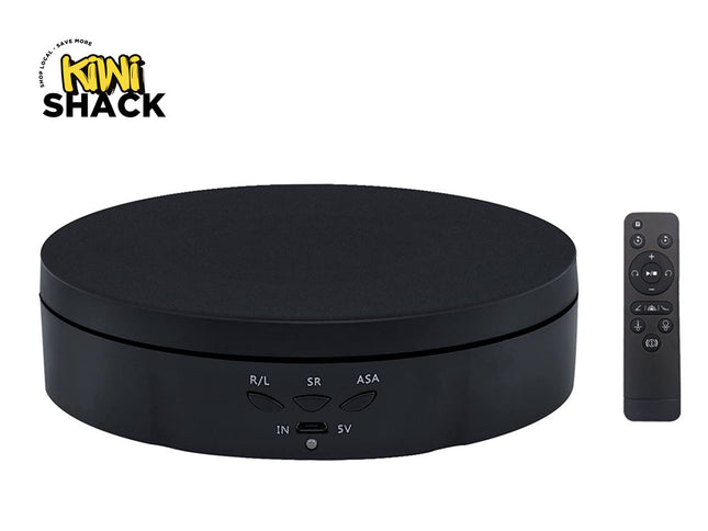 Black electronic device with remote control on a white background, featuring the Kiwi Shack brand.