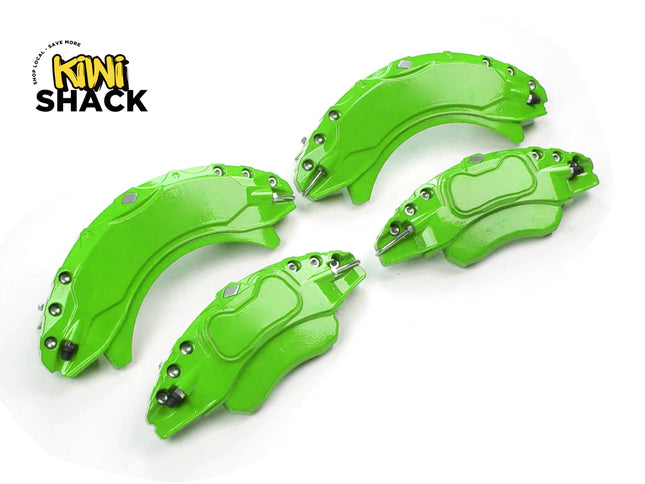 Four green metal brake pads on a white background with 'Kiwi Shack' branding.