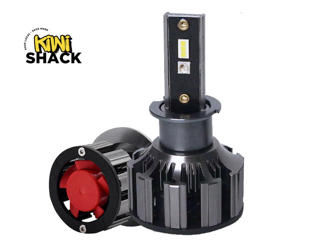 A black LED light bar with a ribbed metal heatsink and a red cooling fan attached to the side, shown on a plain white background with the Kiwi Shack logo in the top-left corner.