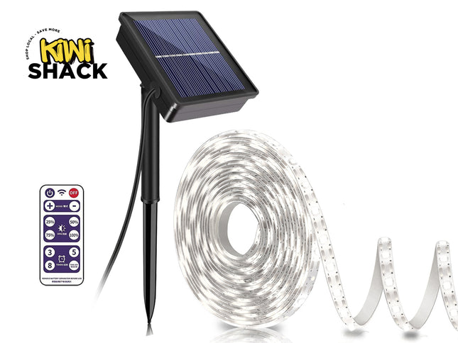 Solar-powered LED light strip with remote control and Kiwi Shack logo on a white background