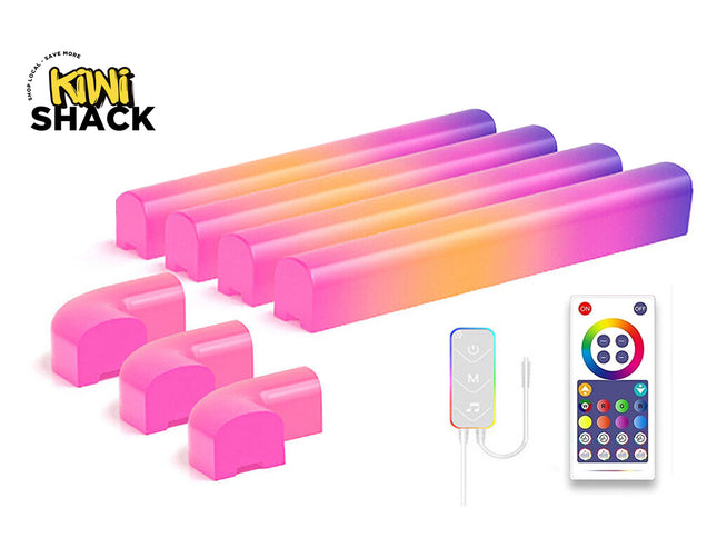 A set of six Mini Shack RGB LED light bars with a pink-to-purple gradient, shown with four pink end caps, a wireless remote control, and a small controller on a white background.