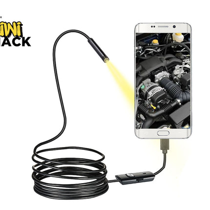 Kiwi Shack endoscope with smartphone displaying engine inspection on a white background