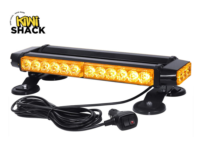 A black Kiwi Shack LED light bar with bright amber lights, shown with its black power cord and plug on a white background. The Kiwi Shack logo is visible in the top-left corner.