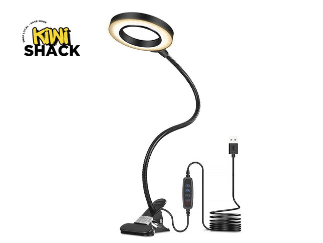 Black LED desk lamp with flexible arm and clip, featuring Kiwi Shack logo.