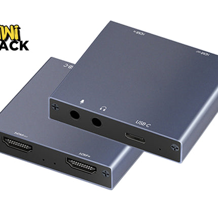 Two compact silver metal HDMI adapters stacked diagonally on a white background, with a Kiwi Shack logo in the top-left corner.