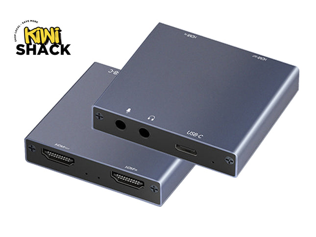 Two compact silver metal HDMI adapters stacked diagonally on a white background, with a Kiwi Shack logo in the top-left corner.