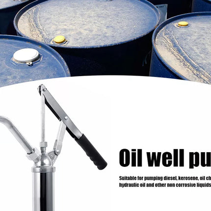 Oil well pump with oil drums in the background