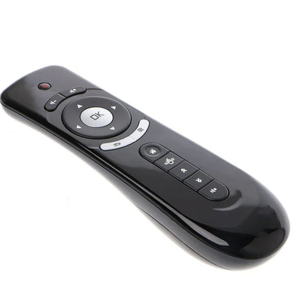Black remote control on a white background