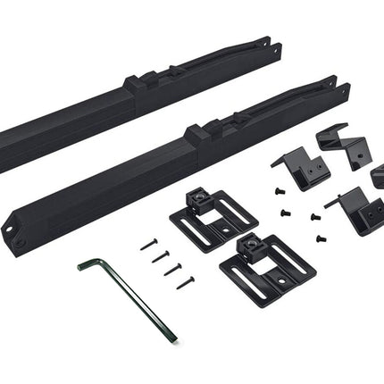 Black metal brackets and components on a white background