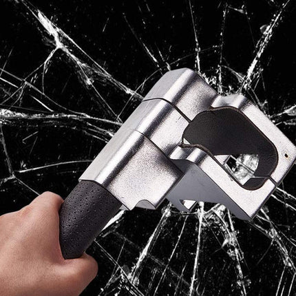 A hand holding a silver and black glass breaker tool, shown striking against a black background with shattered glass cracks radiating outward.
