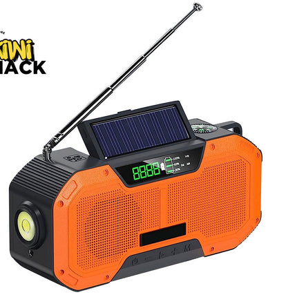 Orange and black portable radio with solar panel and compass, branded 'Kiwi Shack'.