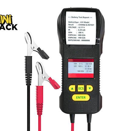 Battery tester with clamps and display screen on a white background, branded 'Kini Shack'.