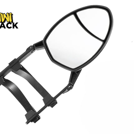 Black dual-view clip-on towing mirror with an elongated aerodynamic frame, a flat/convex split mirror glass layout, adjustable mounting bracket/strap arms, and the Kiwi Shack logo watermark.