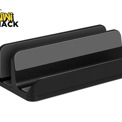 A black dual vertical laptop stand with protective grey silicone padding inside the slots, featuring a "Kiwi Shack" logo in the top left corner.