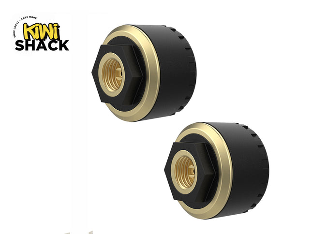 Two cylindrical black and gold adapters with threaded brass centers, displayed diagonally against a white background, featuring a "Kiwi Shack" logo in the top left corner.