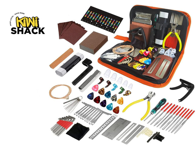 Kiwi Shack guitar repair kit with an open orange zip case and many small tools and parts arranged around it on a white background, including pliers, screwdrivers, metal files, tone pieces, and other repair accessories.