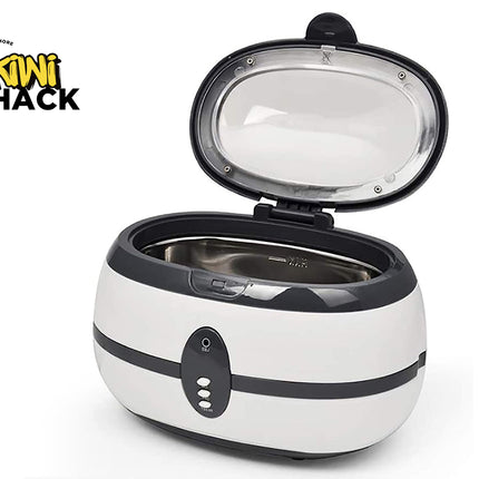 White ultrasonic cleaner with open lid on a white background, featuring the Kiwi Shack logo.