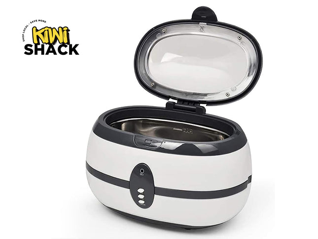 White ultrasonic cleaner with open lid on a white background, featuring the Kiwi Shack logo.