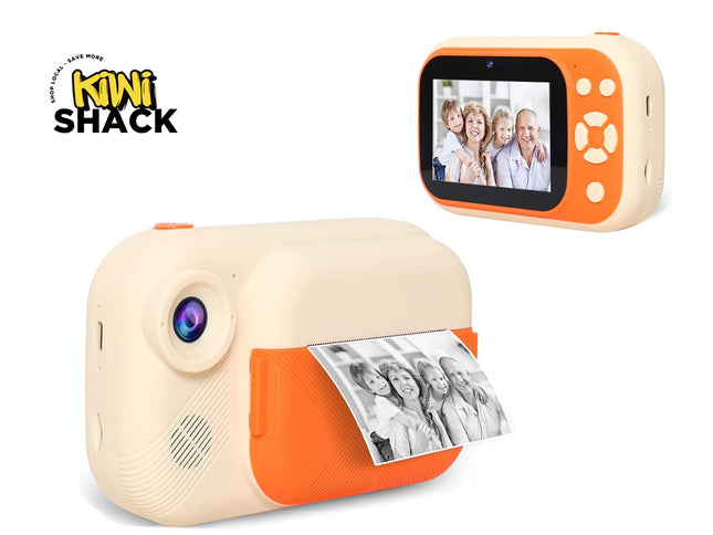 A compact Kiwi Shack instant camera in cream and orange, shown from the front with a photo print emerging from the slot, and a smaller rear view showing the screen and buttons. The Kiwi Shack logo is visible in the top left corner.