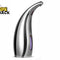 A polished silver automatic touchless soap dispenser with a curved nozzle and a vertical liquid level window showing purple soap inside, set against a white background. A "Kiwi Shack" logo appears in the top-left corner.