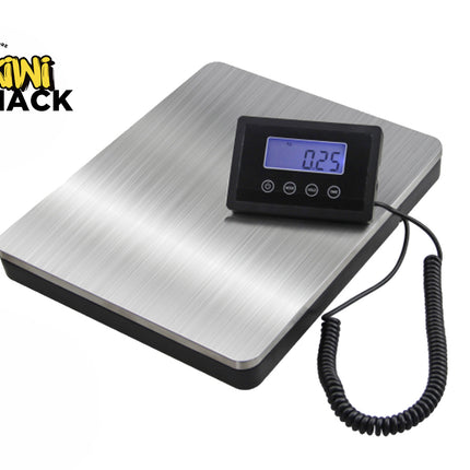 Digital scale with a digital display on a white background, branded 'Kiwi Shack'.