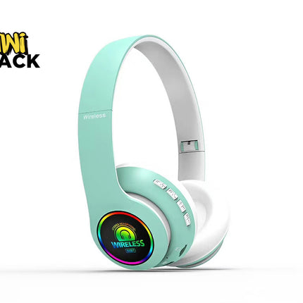 Mint green and white mini wireless headphones by Mini Shack, featuring a colorful LED display on the ear cup, shown on a white background with the Mini Shack logo in the top-left corner.