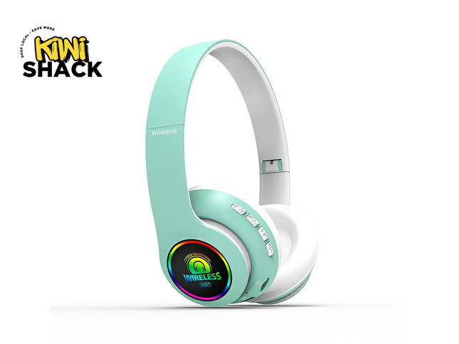 Mint green and white mini wireless headphones by Mini Shack, featuring a colorful LED display on the ear cup, shown on a white background with the Mini Shack logo in the top-left corner.